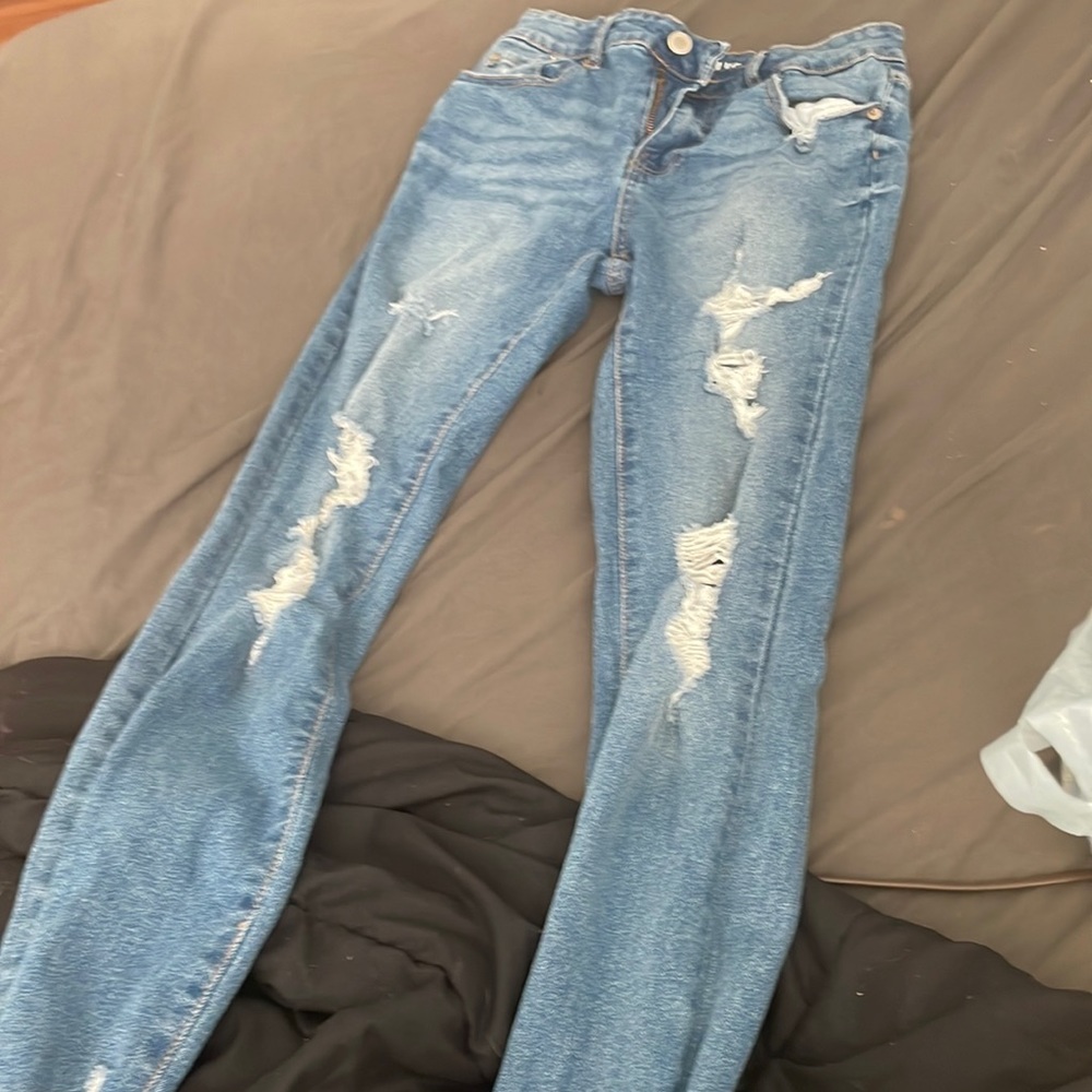 Color dark blue in good condition never been worn size 5/27w